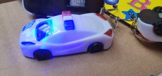 Brelok 12szt auto policyjne ze światłem